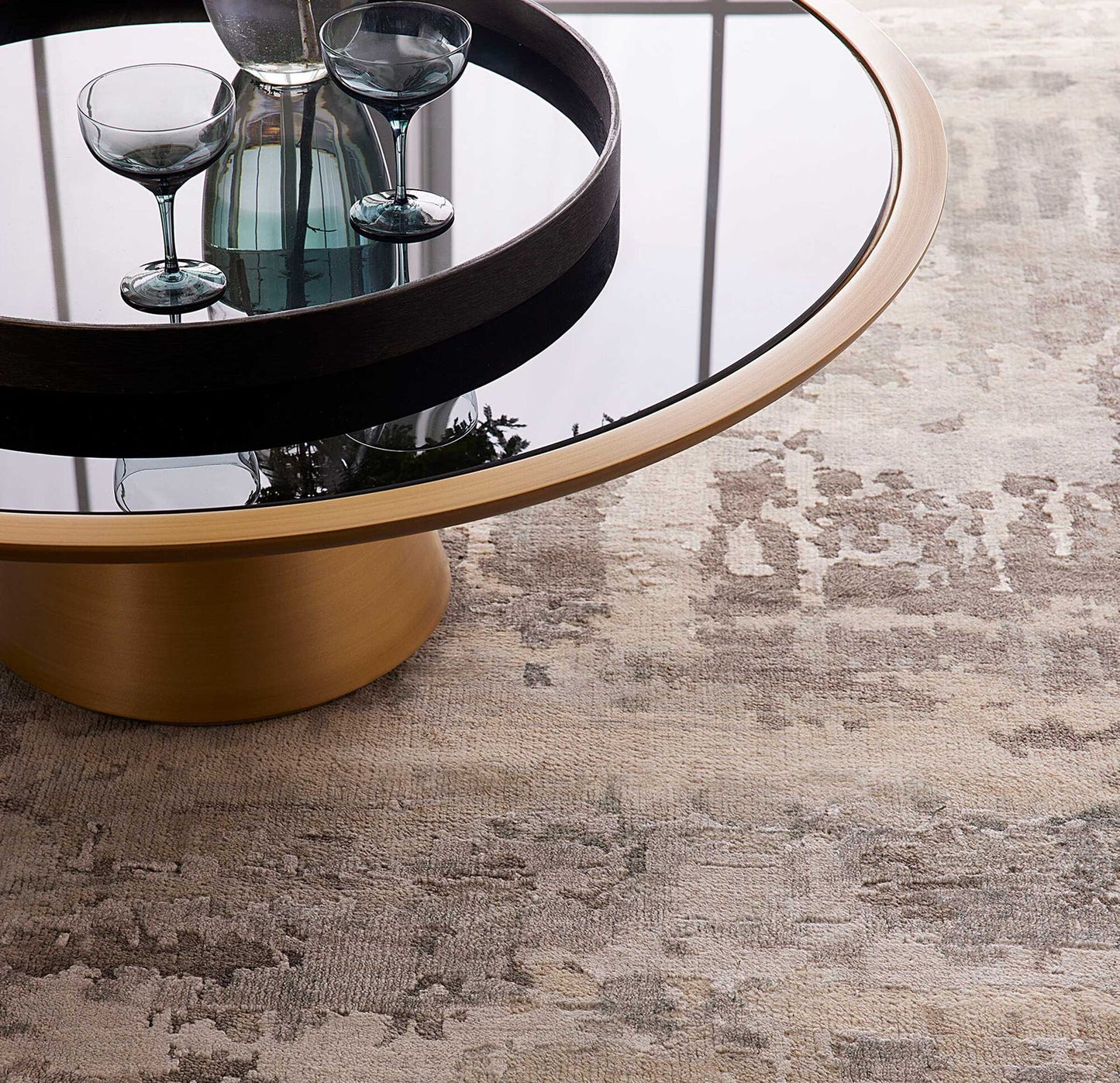 Close up shot of the Modern Elements glass top insert that is the hallmark of The Addie. Chic and modern, elegant and refined - this cocktail truly encapsulated modern luxury.