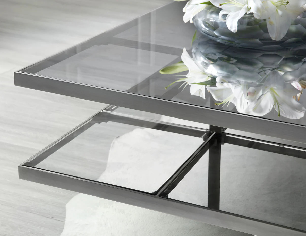 This is a detail shot of the Romo cocktail table from Modern Elements Furniture, showcasing the clean lines of the table frames contemporary aesthetic.