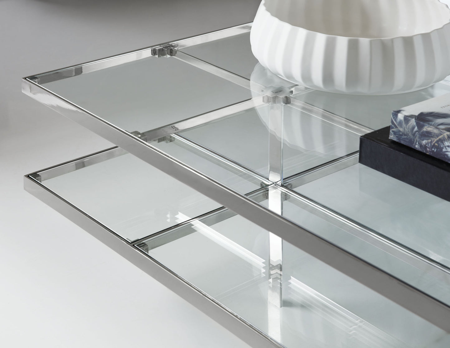 This is a detail shot of the Romo cocktail table from Modern Elements Furniture, showcasing the clean lines of the table frames contemporary aesthetic.