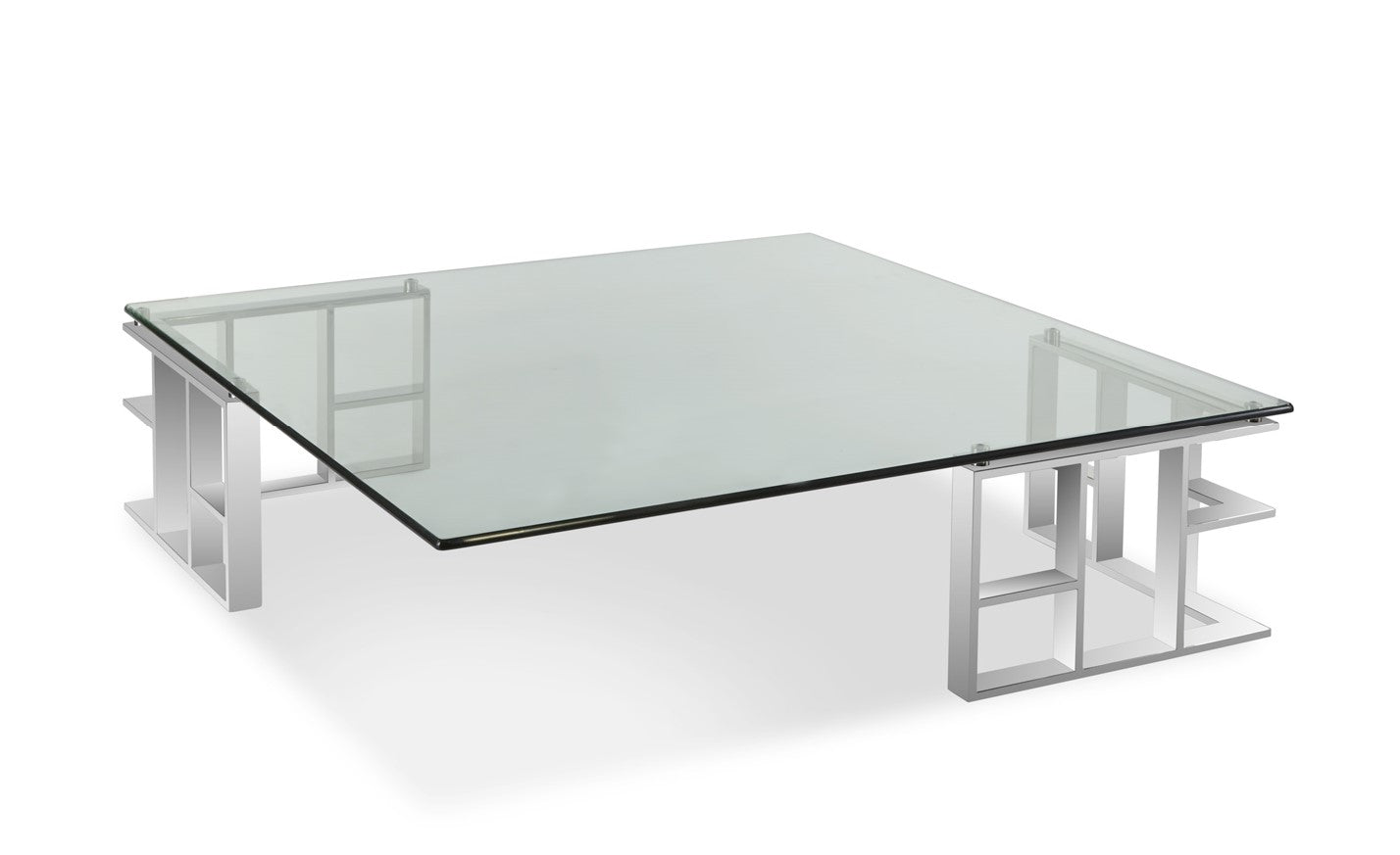 Pictured in this silo photo is the Template Cocktail by Modern Elements Furniture. The Template Cocktail Table is a stunning example of modern design with a futuristic flair, making it a captivating centerpiece for any living room or lounge area.
This square-topped cocktail table features a sleek glass top paired with a stainless steel frame, creating a sophisticated and airy aesthetic. The table’s base showcases a unique geometric design with two 90-degree wrapped corners.
