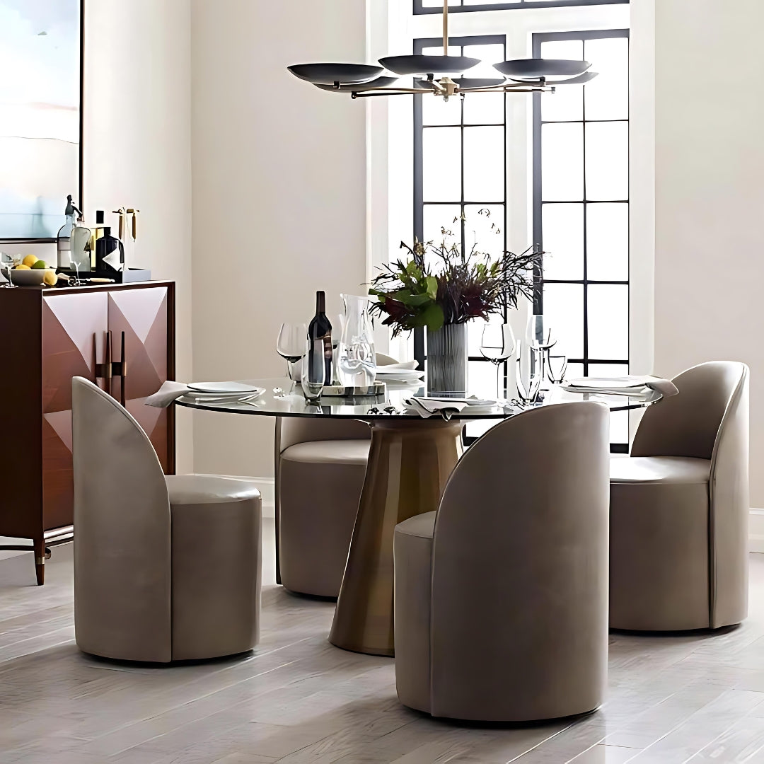The Addie dining table, in this brass finish, is perfect for entertaining weekend guests for dinner or for cozy Sunday brunches with the family. A contemporary take on a classic piece, the Addie Dining is a timeless modern design, and with quality glass and American made resin, you can count on the quality manufacturing of The Addie. The clean lines and warm tones of the brass finish are sure to elevate any dining space to the next level of elegance.