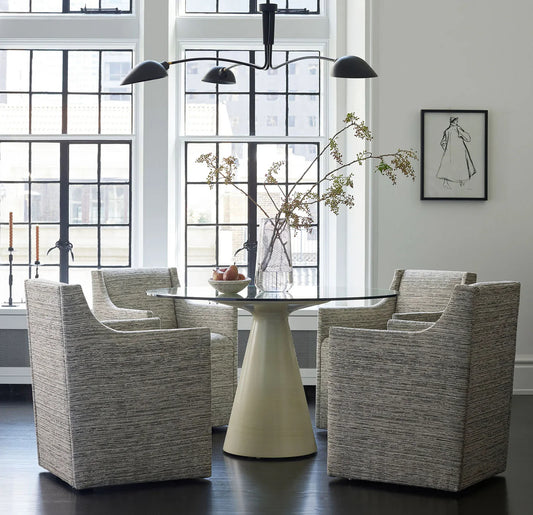 The Addie dining table, in this solid white finish, is perfect for entertaining weekend guests for dinner or for cozy Sunday brunches with the family. A contemporary take on a classic piece, the Addie Dining is a timeless modern design, and with quality glass and American made resin, you can count on the quality manufacturing of The Addie.