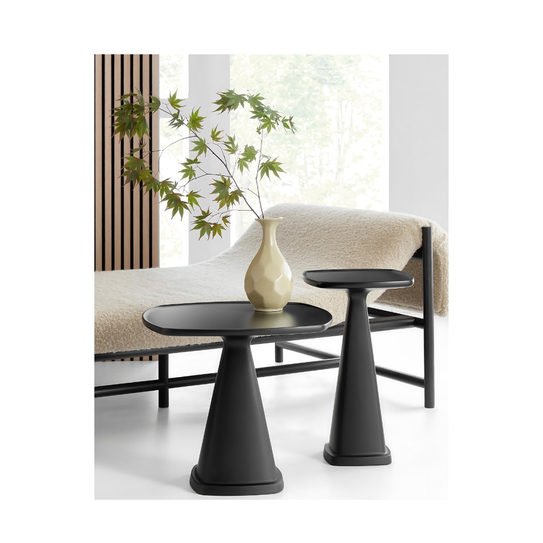 Pictured in this lifestyle photo and shown in the black pearl finish, The Oscar Pull-Up Drink Table is a sleek and stylish resin accent table that perfectly balances form and function.
