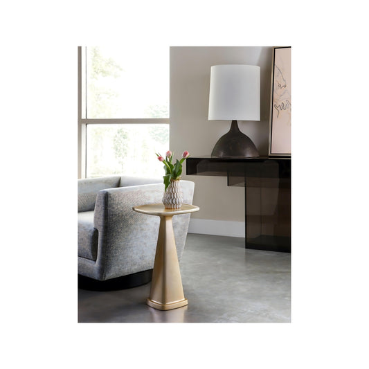 Pictured in this lifestyle photo and shown in the champagne finish, The Oscar Pull-Up Drink Table is a sleek and stylish resin accent table that perfectly balances form and function.

Proudly made in America, this table features a slender base and a well-proportioned tabletop, making it ideal for tight spaces or cozy nooks. With its sleek lines and a range of gorgeous finish options, the Oscar Pull-Up Drink Table is a versatile piece that adds a contemporary touch to any living space. 