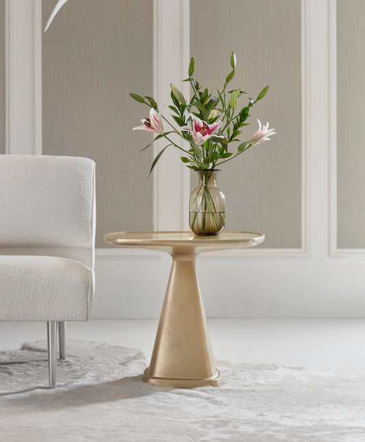 Pictured in this lifestyle photo in the champagne leaf finish, The Oscar Side Table is a stylish and functional resin accent table that brings a contemporary edge to any room.

Made in America, this table is designed with a broader tabletop and a shorter, sturdy base, offering the perfect balance between practicality and modern design. With its sleek lines and versatile finish options, the Oscar Side Table complements any living space, whether used as a chairside companion or a decorative accent piece. 