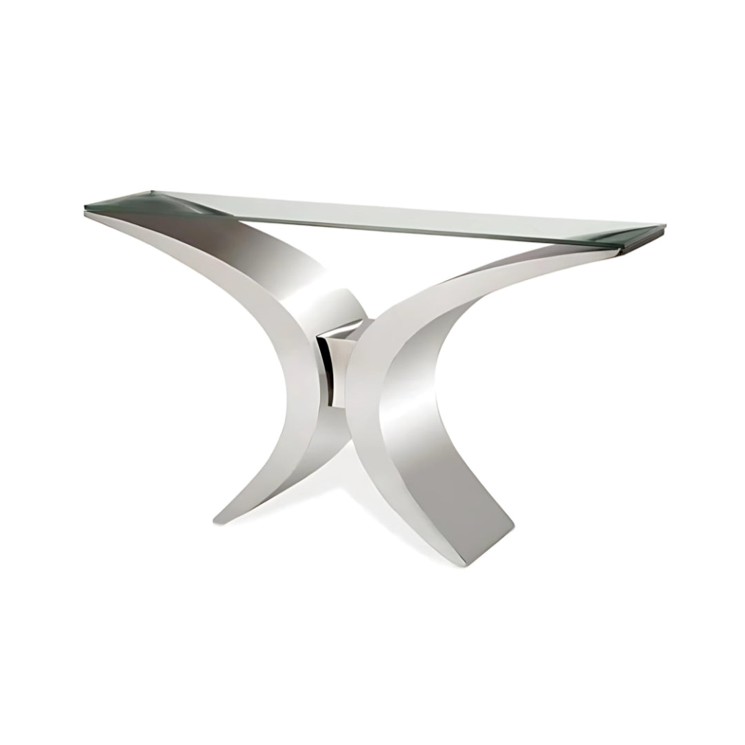 Pictured here in this silo shot, the Wings Console Table features a sleek clear glass tabletop and a stainless steel metal frame. The Wings console table draws inspiration from a classic winged, symmetrical design that adds a sculptural element to your home decor.
