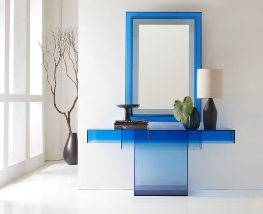 The sleek, angular design of "The Gelo" creates a visually dynamic statement, offering both aesthetic appeal and functional surface space. Perfect for displaying decor, art pieces, or serving as a stylish accent in your home, "The Gelo" Console Table seamlessly blends innovation with elegance, transforming any space into a showcase of modern design.