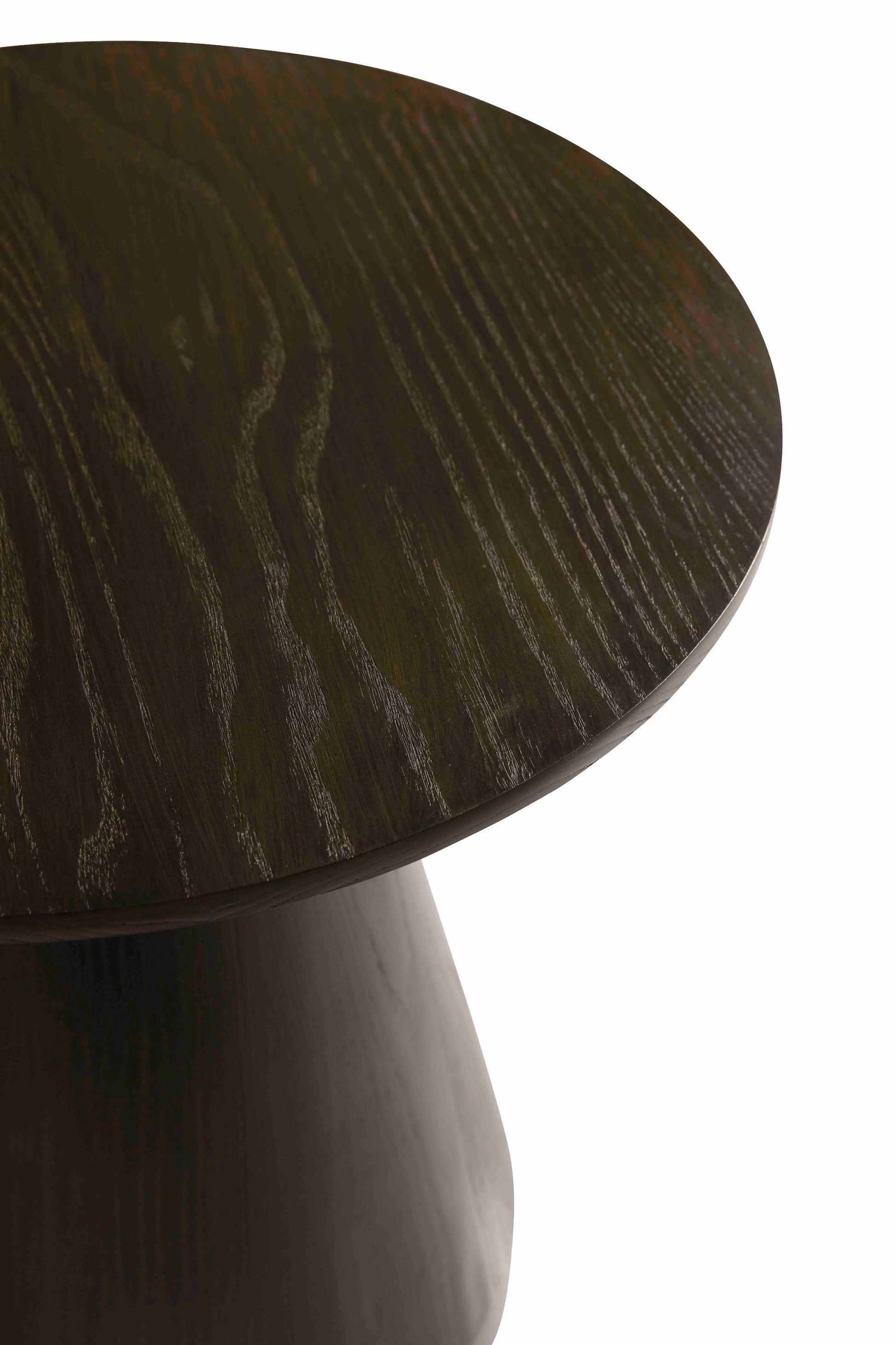 Pictured in this detail shot is the Heartland end table by Modern Elements in the darker option of the cerused finish.