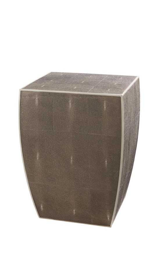 Pictured in this silo shot, "The Odessa" Pull-Up Table is a sleek and luxurious resin accent piece that adds texture and elegance to any room.

Made in the USA, this resin table features a sophisticated cast pebble leather texture that brings a unique tactile element to its modern design. Its sleek shape and refined finish in Shark Grey make it the perfect addition to contemporary living rooms, bedrooms, or lounge areas.