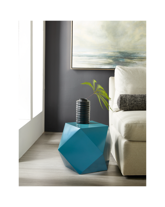 The Tetra Pull-Up Table is a vibrant and stylish accent piece that brings a touch of modern flair to any room. Proudly made in America with exceptional quality craftsmanship, this geometric spot table features a unique cast design that adds depth and dimension to your decor, making it a lively addition to living rooms, bedrooms, or lounge areas. 
